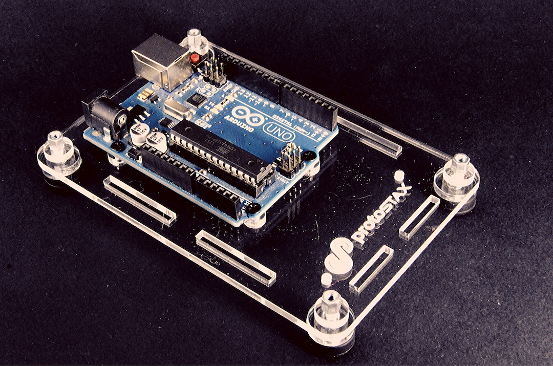 ProtoStax Enclosure / Case in Platform Configuration showing Arduino. Pre-drilled and threaded mounting holes make assembly easy and convenient. Acrylic risers elevate board off the surface for improved airflow